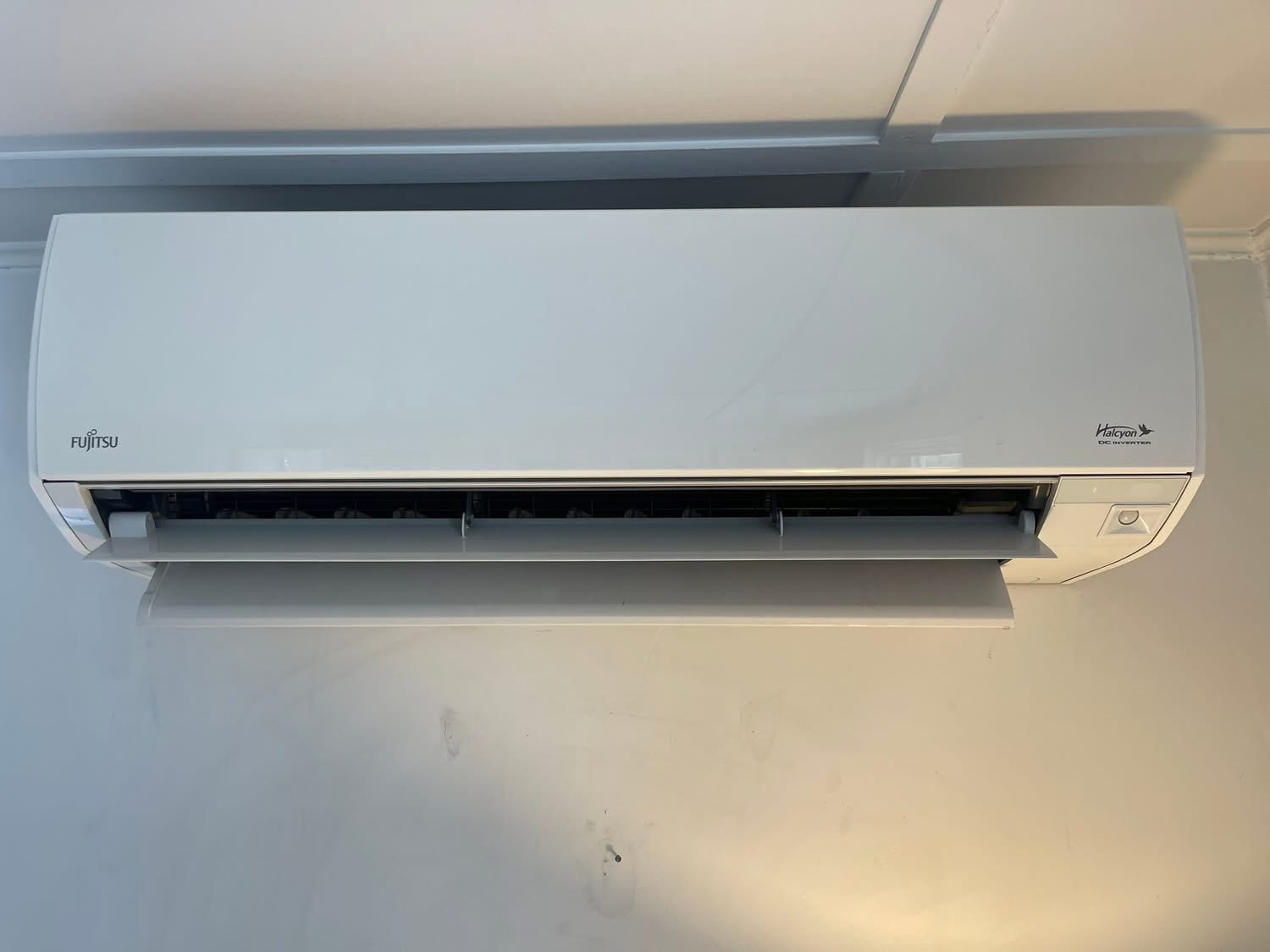 Fully reassembled Fujitsu mini split heat pump running clean after service